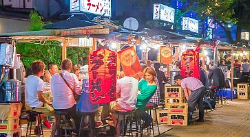 Fukuoka, Japan - June 29, 2014:fukuoka's famous food stalls (yatai) located along the river on Nakasu Island