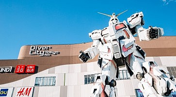 Tokyo, Japan - November 23, 2018 : Odaiba Diver City Tokyo Plaza shopping mall and real-size Gundam robot